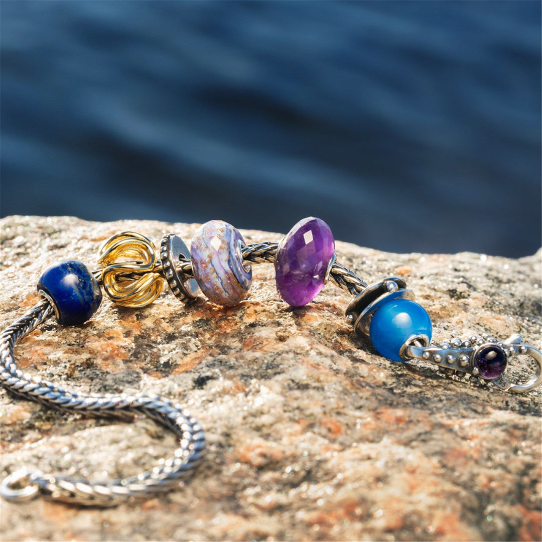 Violet Conviction Bead by Trollbeads. Faceted Beads.