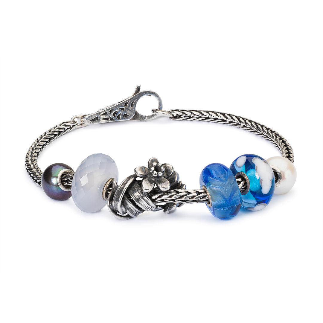 Engraved Poetic Bead by Trollbeads. Faceted Beads.