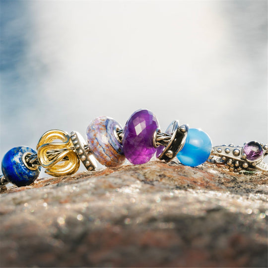 Violet Conviction Bead by Trollbeads. Faceted Beads.