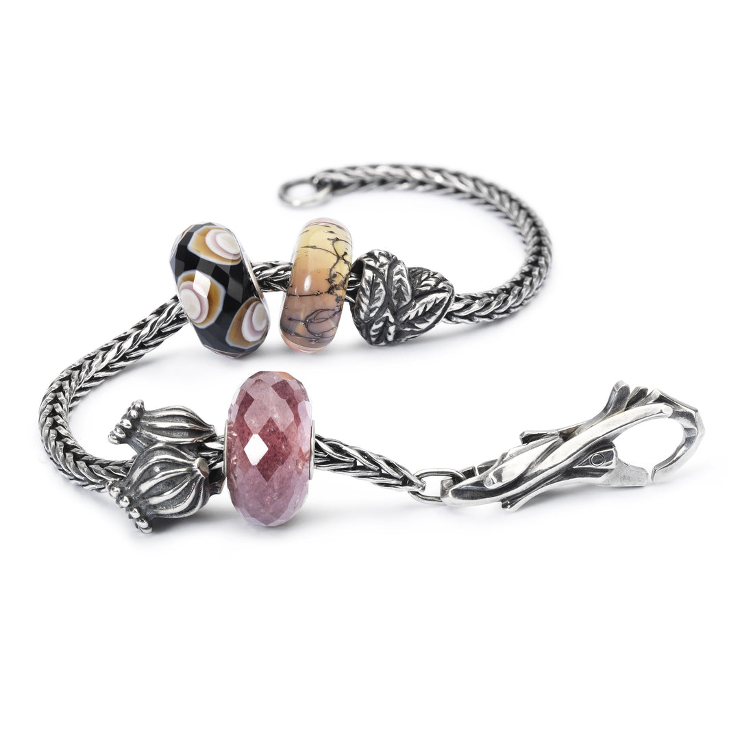 Strawberry Quartz by Trollbeads. Faceted Beads.