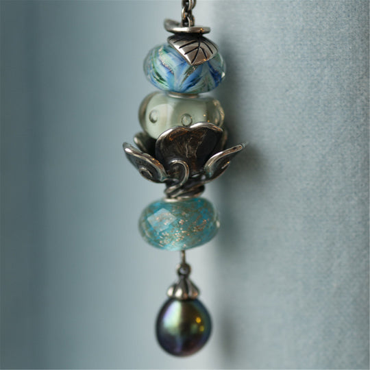 Fantasy Necklace with Peacock Pearl by Trollbeads. Necklace.