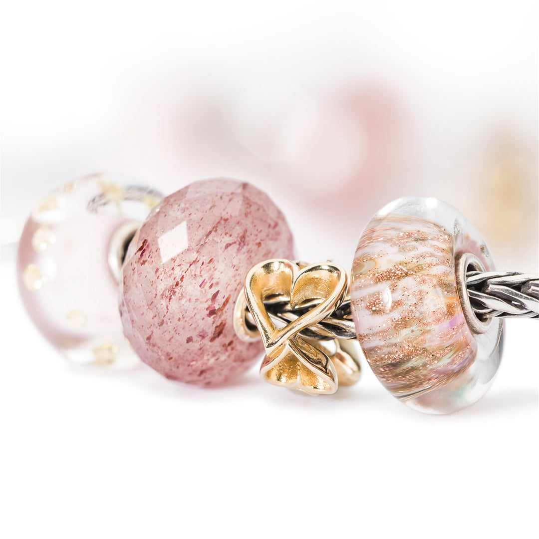 Strawberry Quartz by Trollbeads. Faceted Beads.